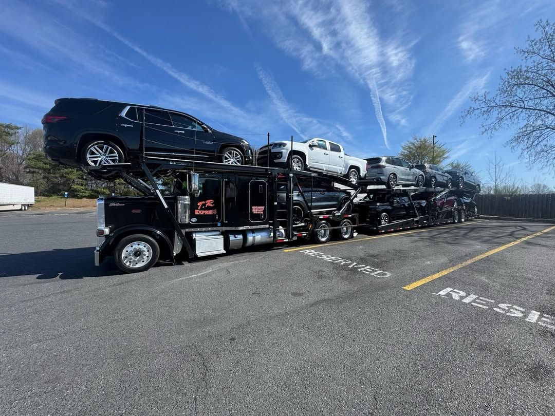 Loaded car carrier on a sunny day